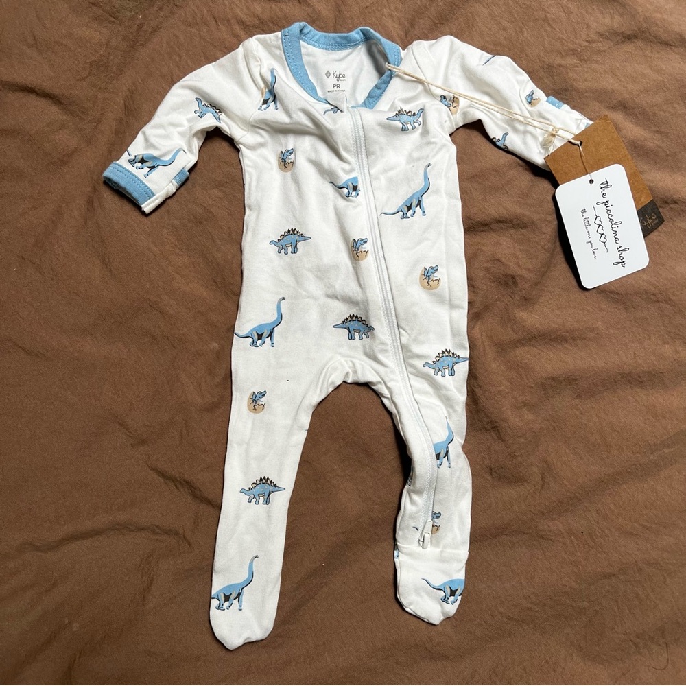 Kyte BABY White and Blue Footie One Piece with Dinosaur Print